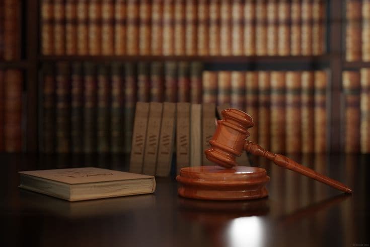 Ketika Hukum Nasional Berdansa dengan Arus Global: Sebuah Analisis Transformasi Sistem Hukum